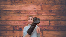 Load and play video in Gallery viewer, background wood lamia design showing fingerless black long gloves