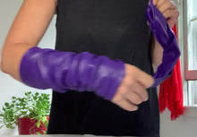 Load and play video in Gallery viewer, Product video: woman arms showing how to wear purple leather fashion arm sleeves
