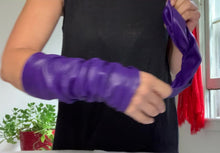 Load and play video in Gallery viewer, Product video: woman arms showing how to wear purple leather fashion arm sleeves