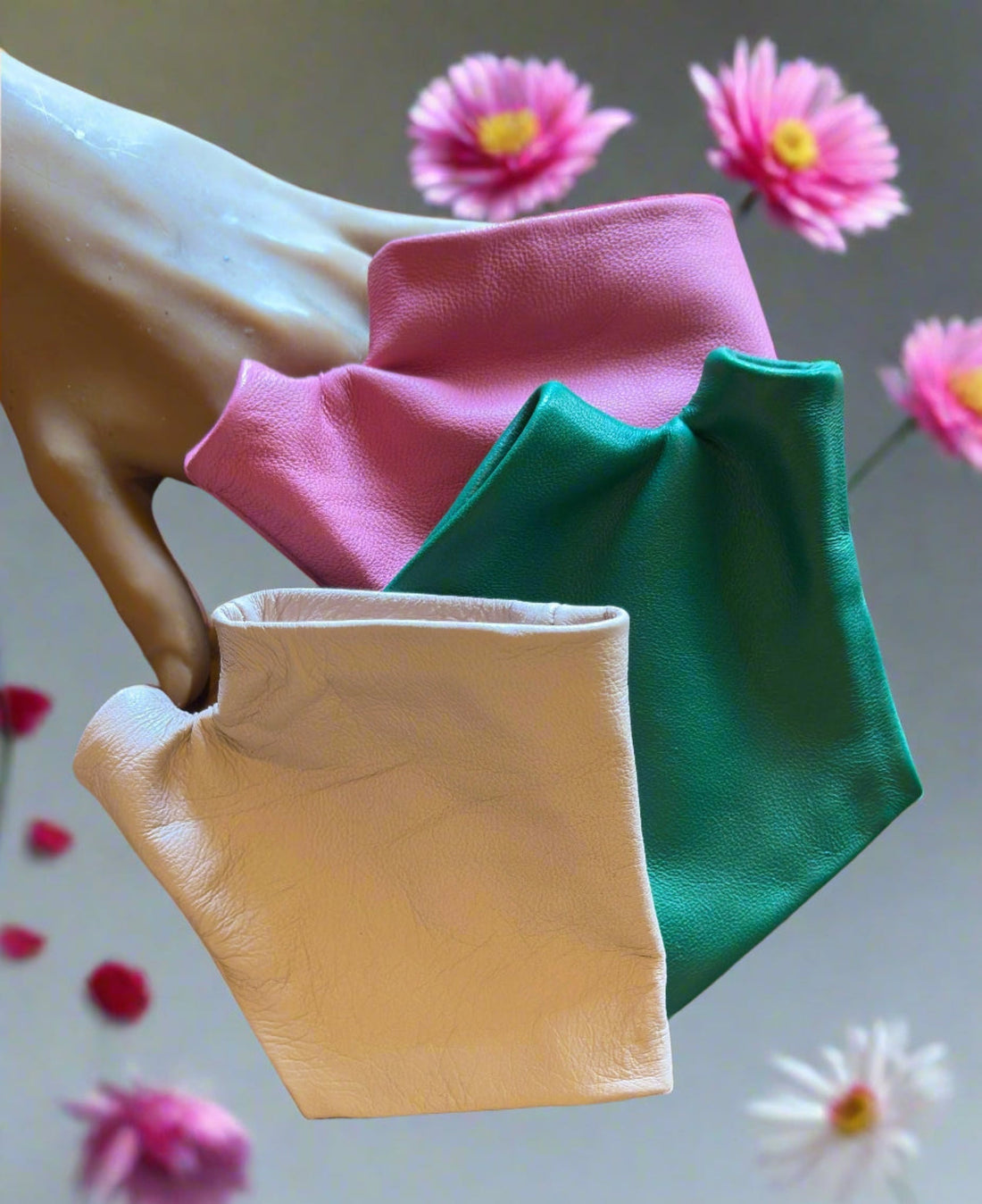 Romantic couple holding Lamia Design leather gloves in spring