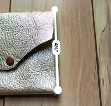 Load image into Gallery viewer, Gold leather wallet with a button on a wooden surface, showing measurement details.
