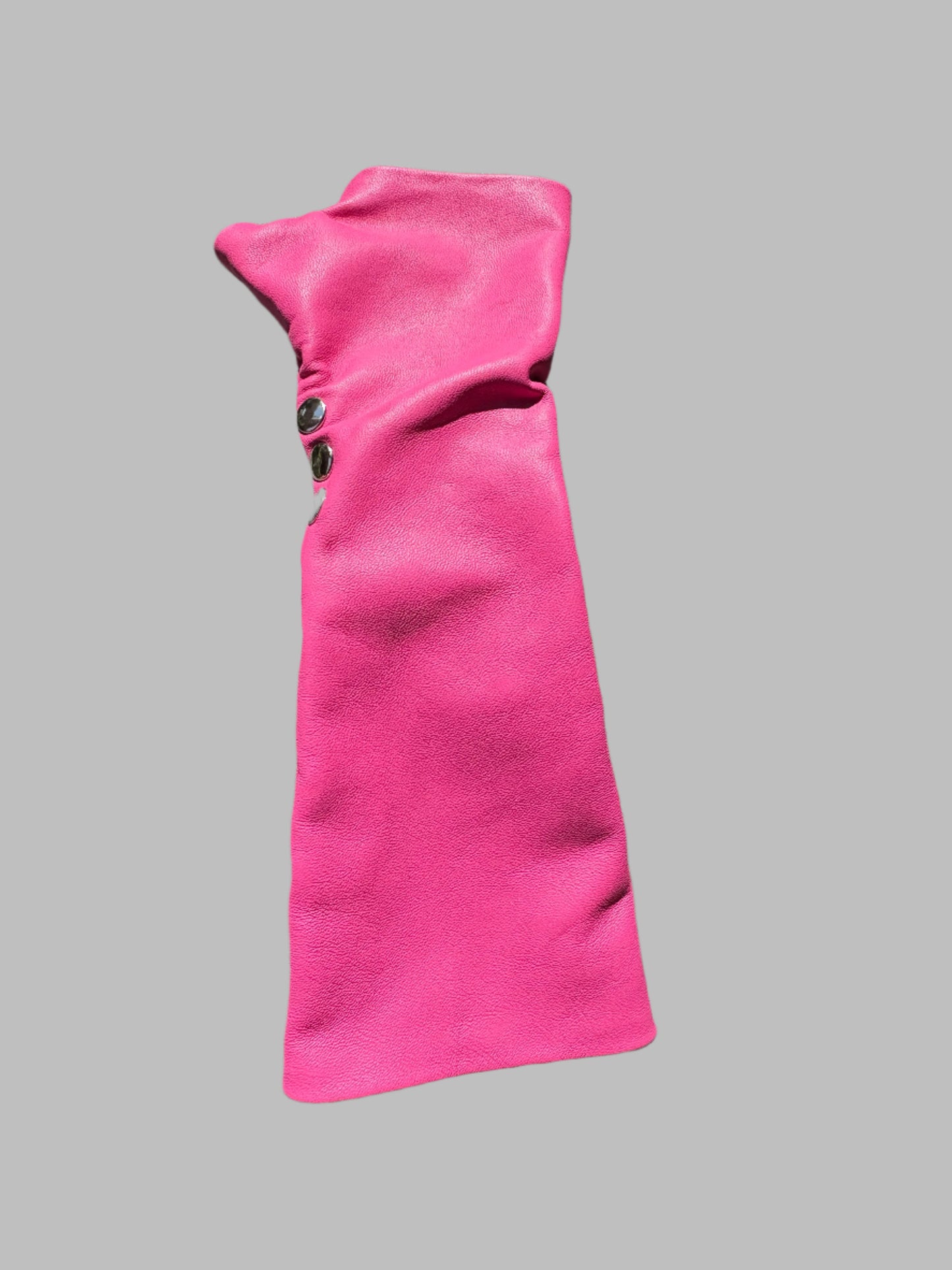 One fingerless pink leather glove with three silver snaps